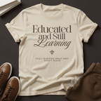 Educated & Still Learning – Unisex Nostalgia Graphic Tee